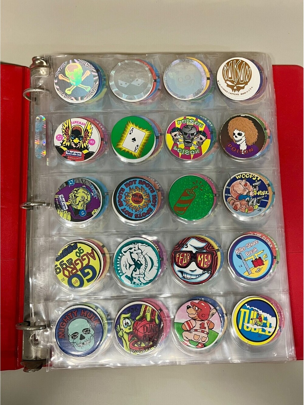 Lot of 239 Vintage Pogs With Notebook and Protector Sheets